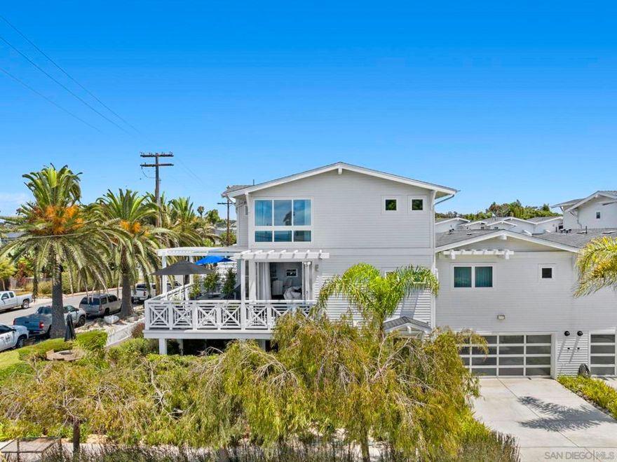 On the corner of Garfield & Walnut...Discover this exquisite, high-end luxury corner unit townhome, just 1 block from picturesque beaches of Carlsbad, offering stunning ocean views! This coastal gem has been meticulously remodeled to appeal to those w the most refined tastes. Lightly used & in pristine, turnkey condition, this corner unit boasts the largest footprint in the complex, featuring spacious outdoor area w wraparound patio & a 2nd-floor deck, perfect for embracing the quintessential Southern California lifestyle.The 1st floor opens to a lush patio & includes a versatile den/office & a 2ndary BD. You'll also find a full BA & laundry area on this level. Ascend to the 2nd floor to be captivated by the floor-to-ceiling windows & bifold doors that invite ocean breezes, leading to a wraparound deck w ocean views.Kitchen is a chef’s dream, featuring raised ceilings, spacious center island, specially designed reset cabinetry, Miele s/s appliances: gas stove, dishwasher & steam oven; and a side-by-side Sub-Zero refrig-all of which are still under warranty.Experience the open-concept living area w soaring ceilings, recessed lighting, ceiling fans, custom window coverings, & energy-efficient windows. The bi-fold doors seamlessly blend indoor & outdoor spaces, perfect for al fresco dining. The 2nd floor also hosts an elegant & secluded primary suite w a customized walk-in closet, dual vanities, a spacious shower & separate cast iron tub. An impressive upstairs loft bedroom w an ensuite BA & walk-in closet offer add'l ocean views.2-car garage+2-car driveway...(cont.supplement)  On the corner of Garfield & Walnut...Discover this exquisite, high-end luxury corner unit townhome, just one block from the picturesque beaches of Carlsbad, offering stunning ocean views! This coastal gem has been meticulously remodeled to appeal to those with the most refined tastes. Lightly used and in pristine, turnkey condition, this corner unit boasts the largest footprint in the complex, featuring a spacious outdoor area with a wraparound patio and a second-floor deck, perfect for embracing the quintessential Southern California lifestyle. The first floor opens to a lush patio and includes a versatile den/office and a secondary bedroom. You'll also find a full bath and laundry area on this level. Ascend to the second floor to be captivated by the floor-to-ceiling windows and bifold doors that invite ocean breezes, leading to a wraparound deck with breathtaking ocean views. The kitchen is a chef’s dream, featuring raised ceilings, a spacious center island, specially designed reset cabinetry, Miele stainless steel appliances: gas stove, dishwasher and steam oven; and a side-by-side Sub-Zero refrigerator -all of which are still under warranty. Experience the open-concept living area with soaring ceilings, LED recessed lighting, ceiling fans, custom window coverings, and energy-efficient dual-glazed windows. The bi-fold doors seamlessly blend indoor and outdoor spaces, perfect for al fresco dining. The second floor also hosts an elegant and secluded primary suite with a customized walk-in closet, dual vanities, a spacious shower, and a separate cast iron tub. An impressive upstairs loft bedroom with an ensuite bath and walk-in closet offer additional ocean views. This home includes an attached 2-car garage with a driveway accommodating two additional vehicles—a significant advantage for beach living. Enjoy wood flooring throughout, custom stairways, a complete "Life Source" water purification system, along with a tankless water heater and newer central A/C. No detail has been overlooked on this property. Comprising three bedrooms plus a den/office that could serve as a fourth bedroom, this townhome is conveniently located near Carlsbad Village’s vibrant shops, Michelin-starred restaurants, farmers market, and train station, providing unparalleled privacy alongside luxury amenities. Everything in this property is custom & exquisitely done! You will be ...