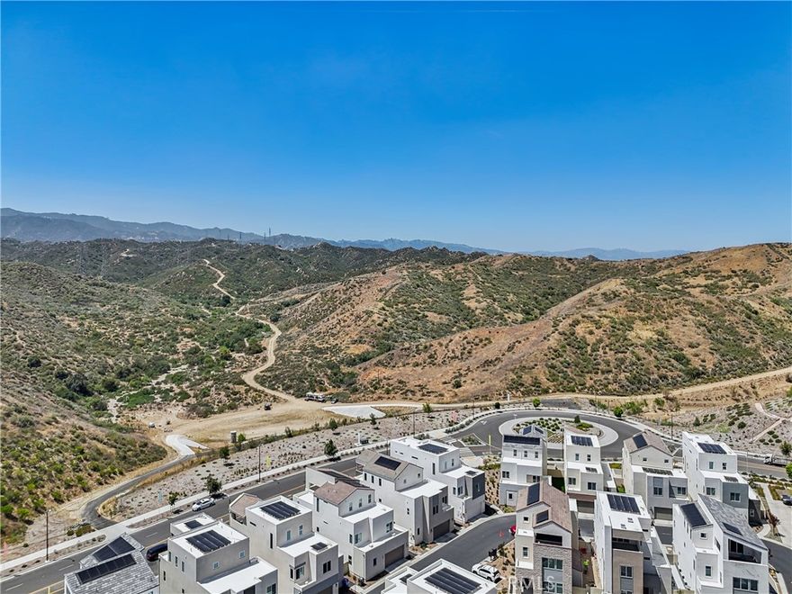Modern Luxury with Views, Resort Amenities & a Special Financing Offer



Welcome to this stunning 4-bed, 4.5-bath Lennar home in the sought-after Valencia Peak community, built in 2024 and designed for modern living. With approximately 3,200 sq ft, this residence blends elegance, comfort, and functionality.



Step inside to an open-concept great room, gourmet kitchen, and dining area that seamlessly flows into a stylish California room through expansive sliding doors—perfect for indoor-outdoor entertaining. The main level features a private guest suite with an en-suite bath.



Upstairs, the luxurious primary suite offers a spa-inspired bath and a spacious walk-in closet. Two additional en-suite bedrooms provide privacy for family or guests. On the third floor, a bonus room delivers breathtaking mountain and city views—ideal for a home office, media lounge, or retreat.



Upgrades include a paid-off solar system, tankless water heater, and water softener