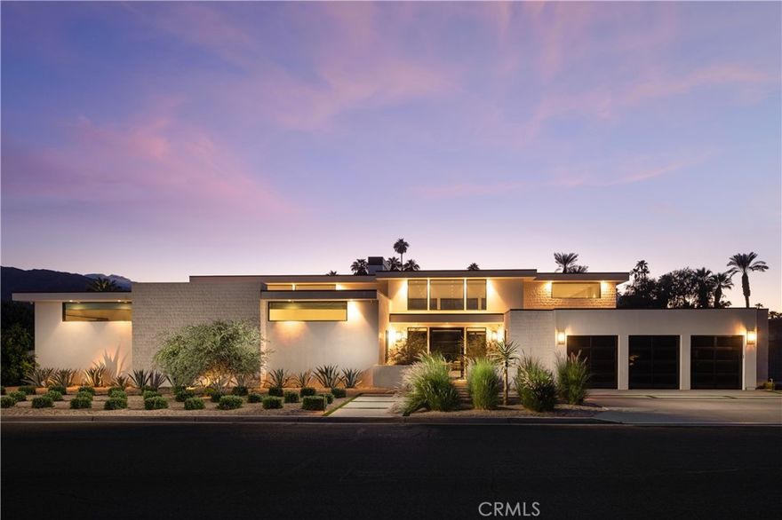 Completed in 2023, this modern desert estate showcases clean lines and expansive proportions. The striking residence encompasses approximately 6,760 square feet of single-level living with six en suite bedrooms and seven-and-one-half bathrooms, providing generous accommodations with thoughtful separation for privacy throughout the home.



Designed for both culinary performance and seamless entertaining, the showpiece kitchen features a 48-inch Dacor range and refrigerator/freezer, complemented by a butler’s pantry with additional ovens and a microwave/convection oven, along with a secondary pantry that includes a GE refrigerator. Stately living and dining rooms center on a dramatic see-through Isokern fireplace measuring 96 inches wide by 30 inches tall, finished in hand-laid firebrick. Nearly 60 feet of La Cantina pocketing glass doors dissolve the boundary between indoors and out, while the game room opens with its own pocketing window wall.



Outdoor living delivers true resort quality, situated on an approximately 28,314 square foot lot with a 40-foot lap pool, spa, tanning shelf, bocce ball court, a tailored putting green, citrus grove, and room for a pickleball court. An approximately 1,470-square-foot covered patio elevates the entertaining environment with a second Isokern fireplace, BBQ, bar seating, and a Kool Fog misting system, creating a year-round retreat.



Smart systems and elevated finishes define the property, including an Elan Nice home automation system for lighting, media, video, and pool; Ecobee climate controls; a 25.7 kW solar PV system; and three laundry areas with a total of three washers and three dryers. An attached three-car garage with EV-ready infrastructure completes the residence. Finished in smooth stucco with limestone accents and black-framed Pella windows, the home embodies timeless desert architecture in a prime Tamarisk Country Club setting, just minutes from world-class golf, upscale shopping, and the dining and cultural scene that make Rancho Mirage one of the desert’s most sought-after addresses.