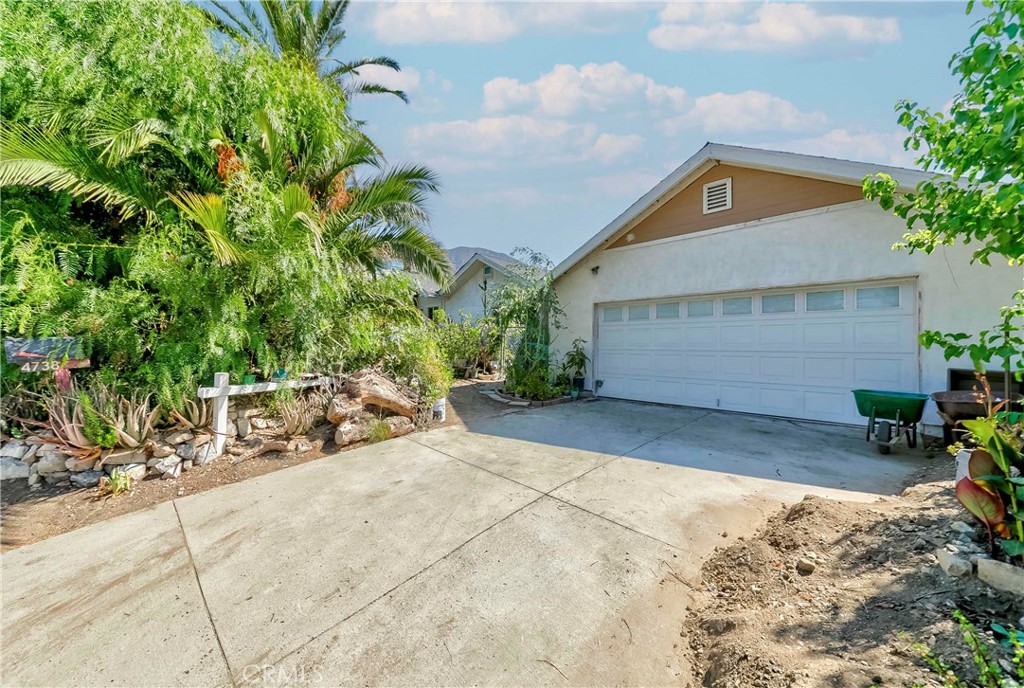 Charming single-family home located in the highly sought-after La Crescenta neighborhood. This well-maintained residence offers 4 bedrooms and 3 bathrooms, providing plenty of space for comfortable living. A permitted addition completed approximately 18 years ago enhances the functionality and layout of the home. In or around 2007, pursuant to the required permit, the construction of a retaining wall and drainage system was duly completed. The spacious backyard features a variety of mature fruit trees, creating a peaceful and private outdoor retreat. Conveniently located near top-rated schools, parks, shopping, and dining, this property offers both comfort and accessibility. A great opportunity to own a versatile home in a desirable community.