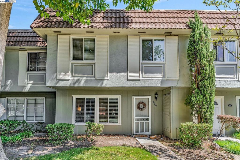 Desirable Las Positas Gardens neighborhood, this rare 4-bedroom, 2.5-bath townhome offers approximately 1,474 sq ft of thoughtfully designed living space. Enjoy an open, light-filled floor plan featuring spacious living and dining areas, an updated kitchen with white cabinetry, sleek quartz countertops, and abundant storage. The expansive primary suite includes a private ensuite bath, complemented by three additional generously sized bedrooms and a full bath upstairs. Further highlights include an indoor laundry room conveniently located off the kitchen, a stylish half bath, laminate flooring, ceiling fans, and more. Step outside to your private patio with a storage area, leading directly to covered parking for two vehicles. Ideally situated near BART, shopping, the 580/680 freeways, award-winning schools, and historic downtown Pleasanton. This home offers both comfort and convenience in one of the area's most sought-after locations!