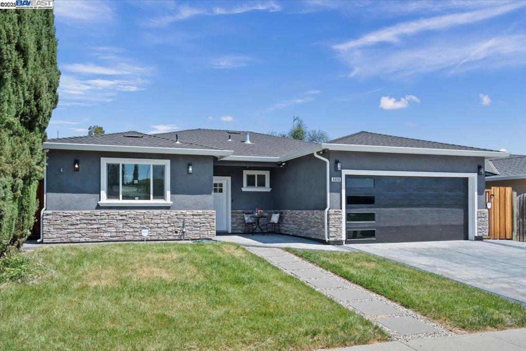 Light, bright and airy this home is completely rebuilt in 2024. This North facing home has it all. From an open concept living with the latest features, From brand new floors throughout to new roof, new foundation. Boasting Kitchen w/ granite counter tops, center island, new cabinets, dual pane windows throughout the home, brand new appliances, new landscaping, and a living room that opens up to a beautiful finished backyard patio creating an indoor/outdoor entertaining area. With so much more to offer. Come see for yourself. Open House this weekend- Sept 6-7 from 1-4 PM.