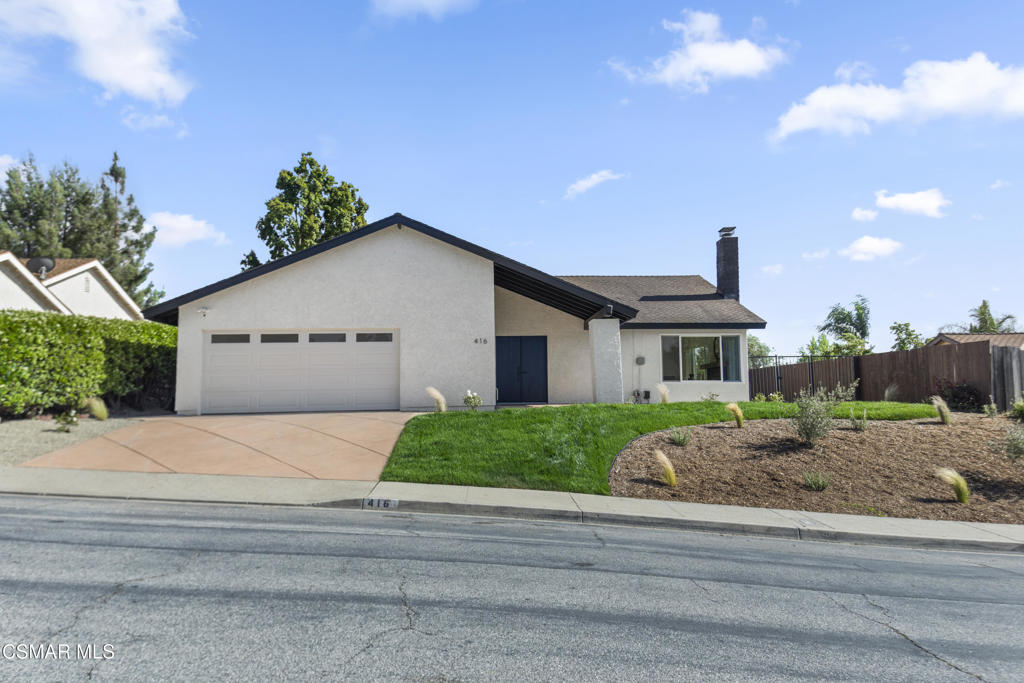 Welcome to this beautifully reimagined single-story home in the heart of Thousand Oaks. Thoughtfully redesigned from top to bottom, this unique gem blends modern style with everyday comfort, offering the feel of a brand-new home. Step inside to the bright living room with vaulted ceilings and a cozy fireplace that flows into the dining area. The family room opens to a modern kitchen featuring a custom wood-detailed peninsula illuminated by accent lighting, quartz countertops, brand-new cabinetry, stainless steel appliances, and serene views of the backyard and distant mountains. Outside, the private, tree-lined yard offers a peaceful escape, perfect for relaxing and enjoying the sound of the breeze through the trees. The spacious primary suite includes sliding glass door to the backyard, generous closets, and ensuite bathroom. All new Milgard dual-pane windows and sliders provide abundant natural light and a seamless indoor-outdoor flow. The garage has been upgraded with epoxy floors, drywall and paint, and new LG front-loading washer and dryer. Additional upgrades include fresh interior and exterior paint, recessed LED lighting, drought-tolerant landscaping with resort-style lighting, a new 200-amp electrical panel, a 40-gallon Bradford White water heater, and a powerful 4-ton Goodman furnace and AC condenser. And so much more! Top-rated CVUSD, close to schools, shopping, and Wildwood hiking. Expertly crafted by One Eleven Designs, this home is a one-of-a-kind treasure just waiting to be discovered!