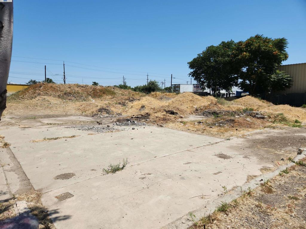 Large level lot. Many possibilities. Zoned General Commercial. The General Commercial (C-G) Zone is intended to provide for commercial areas that offer a wide variety of specialized retail and service uses which are normally developed as a separate individual entity rather than as part of a cluster of uses, serve urban communities or regional markets. Great location right off two major freeways.