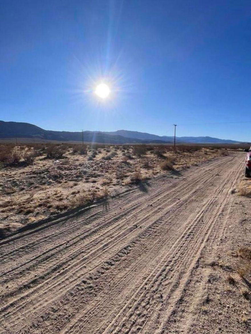 Enjoy the epic views of Johnson Valley on this large 5 acre parcel with road access. Located just down the road from King of the Hammers, this could be an awesome spot for a camp compound, race shop, or single family residence. Amazing panoramic views in all directions. This parcel is priced to sell call now.