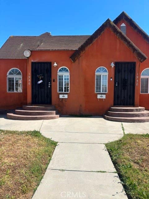 Photo of 1946 W 81st ST, Los Angeles, CA 90047 (MLS # RS26122353)