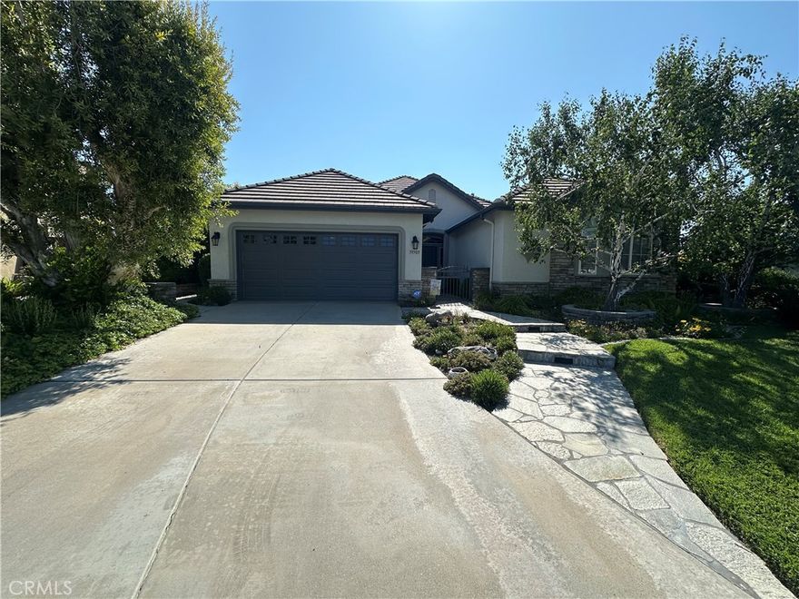 Welcome to Four Seasons Murrieta 55+ Active Retirement Community. This home is the Traditional 2 Floor Plan. The back yard has amazing views of the sunset and surrounding areas! Inside, there are plantation shutters, granite counters, white cabinets, and engineered wood floors - no carpet throughout the home.  Residents of Four Seasons Murrieta enjoy a vibrant community with a variety of clubs and activities, from art classes to yoga, bridge, billiards, and more. Outdoor amenities include a large pool, spa, BBQ area, putting green, golf practice area, horseshoes, shuffleboard, bocce ball, basketball, and lighted courts for tennis, pickleball, and badminton. Indoors, you can take advantage of the gym, library, billiards and card room, craft room, and a large ballroom for events. Nearby, you'll find a major shopping mall with excellent restaurants and movie theaters. Old Town Temecula, with its charming downtown and award-winning wineries, is just a few miles away. Come and discover the active, enjoyable lifestyle waiting for you at Four Seasons Murrieta!