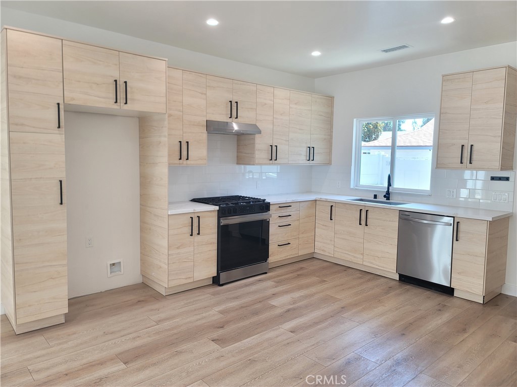 Experience modern living in this beautifully built 3-bedroom, 3-bathroom home located in desirable Granada Hills. THIS HOUSE IS ON A LOT WITH TWO OTHER SEPARATE UNITS., offering added privacy with its own private and separate entrance . Inside, you'll find brand new flooring, a fully remodeled kitchen with sleek appliances, and updated bathrooms with a clean, contemporary style. With a private 2-car garage and the benefits of new construction, this spacious home delivers both comfort and convenience. Don’t miss the opportunity to make this freshly upgraded residence your new home.
