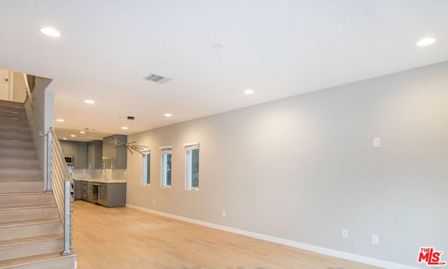 Unit#6548 Modern & sophisticated 2BD/2.5BA, fantastic kitchen with top-of-the-line stainless steel appliances, which opens to large, open and bright living room perfect for entertaining. Gorgeous laminate wood flooring , recessed lighting throughout. Main living area has one half bath. Bedrooms are located on the top floor, equally spacious both with full bathrooms, one bedroom has a small private balcony. Ultra Luxurious bathrooms feature stunning custom tiles and beautiful fixtures. Private attached 2-car garage with direct access to unit and washer and dryer. All utilities paid by tenant, pets ok.