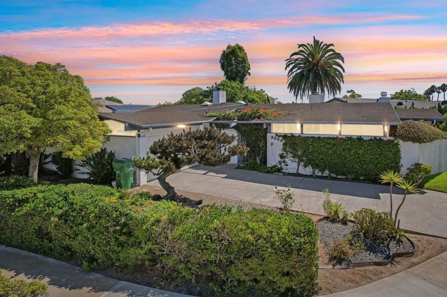Charming single-story gem nestled in the prestigious west end of University City! This home welcomes you through a private courtyard entry into a spacious open floor plan featuring wood-beamed cathedral ceilings and a cozy living room fireplace. The large family room flows seamlessly to a private patio and beautifully landscaped backyard perfect for entertaining or relaxing in peace. Located on the quiet side of Governor Drive, west of Regents Road, this property sits within one of UC’s most desirable neighborhoods. Enjoy the best of coastal living, just miles from La Jolla Shores and within walking distance to top-rated schools, UCSD, parks, and hiking trails. Experience the perfect combination of luxury, location, and lifestyle in one of the nicest homes you’ll find in University City!