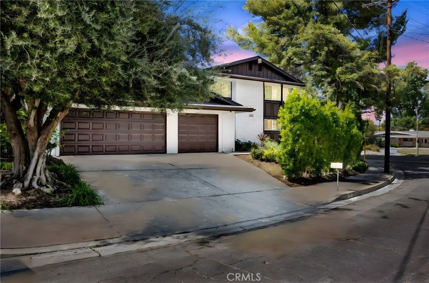 Nestled on a spacious, elevated corner lot, this exceptional totally redone two-story residence in Woodland Hills presents a versatile open-plan layout. Amazing five bedroom and three bath with almost 2,800 interior sq. ft. The lush landscaping and tall trees that envelop the property offer serene views, providing much-needed shade during scorching summer days. Inside, the home features a combination of beautiful upgrades, while recessed lighting adorns the main living areas, creating a well-lit space. A true haven for book lovers, one room showcases an entire wall of built-in bookcases, inviting you to unwind with your favorite novel. Step into the private, fenced backyard, where you'll discover a pool perfect for entertaining and cooling off. Adding to the appeal, this incredible abode enjoys an enviable location near Ventura Blvd, granting quick access to shopping, dining, and excellent schools for your convenience. Moreover, the proximity to Mulholland Dr ensures easy commuting. Don't miss out on this fantastic opportunity! Schedule a tour today to explore the endless possibilities that await you!