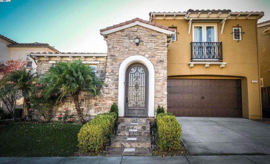 Beautiful Tuscan Residence One at Avanti in Gale Ranch. Northeast Facing showcasing a rare Mediterranean-inspired design within the Gale Ranch community, this stunning residence offers the perfect balance of luxury, privacy, and functionality. Home features 4 bedrooms and 3.5 baths, including a private in-law or casita suite with its own full bath, closet, and separate entrance ideal for guests or multigenerational living. A custom wrought iron front door opens into an inviting foyer that flows through a hallway leading to the casita, offering privacy and comfort right from the entrance. Inside, enjoy fully upgraded hardwood floors, a custom hardwood staircase with tile detailing, and vaulted ceilings that fill the home with natural light.  The chef’s kitchen is equipped with granite countertops, Viking stainless appliances, and a large center island that opens seamlessly to the dining and family areas perfect for entertaining. The primary suite upstairs features serene views, a spa-style bath with dual vanities, and a spacious walk-in closet. Two additional bedrooms share a balcony and a conveniently located upstairs laundry room with a built-in sink. *EV Outside, the home showcases Mediterranean landscaping with mature palms, custom stonework, and low-maintenance front and back