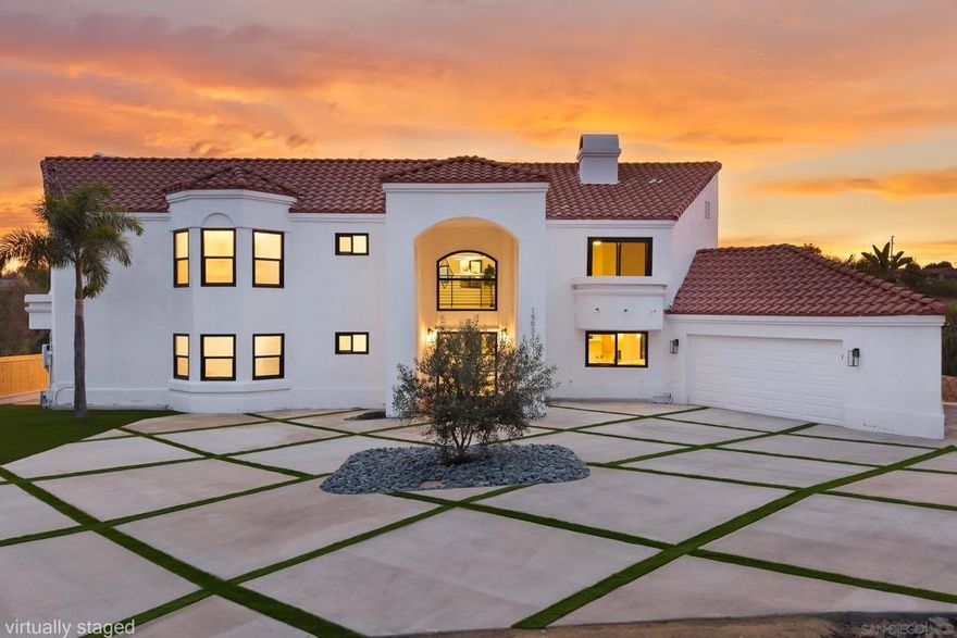 Completely Remodeled Hillside Retreat in Poway  Welcome to 13052 Heath, a stunning hillside home in the heart of Poway that has been fully remodeled with today’s buyer in mind. Every inch of this residence has been refreshed with sleek, contemporary design and high-end upgrades, creating a bright and modern living experience.  The exterior makes a bold first impression with brand-new turf, modern diagonal-pattern concrete, and a statement olive tree that complements the reimagined entry. Inside, soaring ceilings, resurfaced walls, all-new doors, and expansive black-framed windows set the tone for a stylish yet inviting retreat.  The chef’s kitchen is a showstopper, featuring custom cabinetry, waterfall countertops, designer backsplash, and premium appliances. Multiple dining and living spaces showcase new flooring, striking chandeliers, and modern railings, blending form and function seamlessly.  Upstairs, a spacious loft and serene rooms feature designer lighting and ceiling fans. The primary suite offers dramatic picture windows with breathtaking hillside views, a cozy fireplace, and a spa-inspired bathroom with dual vanities, modern fixtures, and a walk-in shower.  Additional highlights include brand-new bathrooms, staircases, and finishes throughout—truly remodeled from head to toe. The private backyard and pool setting provide the ultimate indoor-outdoor lifestyle, perfect for entertaining or unwinding against sweeping hillside views.  Located on a quiet, private street within a highly regarded school district, this home combines tranquility with convenience.