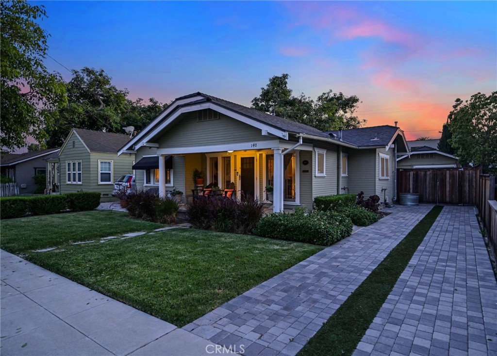 Own a Piece of Tustin’s History! Charming Single-Story Colonial Revival Home Built in 1923 & Designated as a Tustin Historical Property … Welcome to the Wilson House, Named for the Original Homeowner, J.L. Wilson, One of Tustin’s First Mayors. This Property is Currently Part of The Mills Act, Offering its Next Owner Tremendous Savings on Property Taxes! Large Usable 6,000-SqFt Lot has Huge Potential in the Backyard to Build an ADU, Install a Pool & Spa, or Simply Sit & Enjoy the Shade from the 100-Year-Old Fuerte Avocado Tree – Incredible Curb Appeal from the Minute You Walk Along the Tree-Lined Street & Up to the Wilson House, Previously Featured on the Annual Old Town Tustin Home & Garden Tour … All Newer Paver Driveway & Solid Covered Front Porch - Beautiful, Well-Loved & Maintained Craftsman-Style Home has Handsome Original Hardwood Flooring, Crown Moldings & Extensive Custom Built-Ins Throughout - Newer Central HVAC System with Added Air Scrubber – Formal Living Room – Formal Dining Room - Spacious Remodeled Kitchen Features Cream Cabinetry, Granite Countertops with Subway Tile Backsplash, Recessed Lighting, and All Stainless-Steel Appliances – Stylish Black & White Tile Bathroom with Clawfoot Tub/Shower – Pull-Down Ladder to Ample Attic Storage - Whole House Water Filtration System, Plus Additional Filtration System Under the Sink with Alkaline Water – Original 1-Car Detached Garage, Plus Workshop Space at the Rear – Sprawling Backyard is Peaceful & Private with 6-Foot Privacy Fence All Around, Brick Patio Pad and Lots of Grass for Pets & Play – Fruit Trees Include Orange, Yellow Grapefruit, Lemon, Clementine & Enormous Avocado Tree that Produces Fruit Twice a Year - Highly Desirable & Central Location Walking Distance to Peppertree Park & Just Minutes from Old Town Tustin with Restaurants, Shopping and Many Historical Buildings & Museum – Easy Access to the 55 & 5 Freeways - Come Tour this Warm & Welcoming Vintage Home!