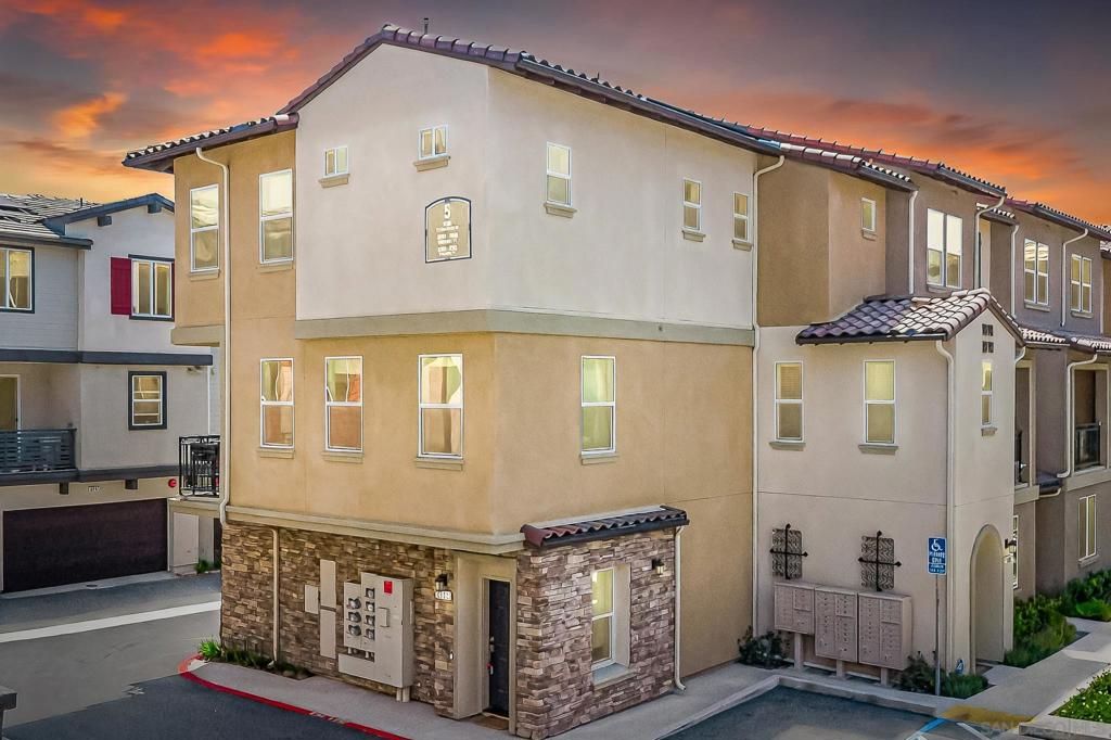 Welcome to a modern, smart, and low-maintenance townhome. Built in 2023, this home features 2 bedrooms, 2.5 bathrooms, and 1,290 square feet packed with high-end features and future-focused upgrades. Thoughtfully designed and truly a move-in-ready home. Step inside to discover an open-concept living room, contemporary finishes, and luxury smart home features… including a Tesla EV charger, smart thermostat, smart security system, and owned solar, making this home as safe and efficient as it is stylish. Additional features include a 2-car garage and a kitchen big enough for the whole family; this is truly move-in ready with no stone left unturned. Tucked into an up-and-coming neighborhood, this is the perfect opportunity for a buyer looking to secure long-term value and future equity growth. With an affordable HOA of just $238/month, you’ll enjoy modern amenities without the steep price tag. Whether you're a first-time buyer or someone seeking a zero-maintenance lifestyle with all of the luxury amenities, this home checks every box. Modern. Efficient. Elevated. Welcome to your next chapter.