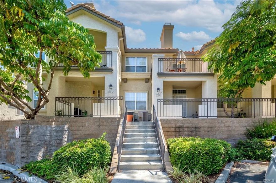 *** MOVE IN DATE : NOV 24 *** Located in the gated La Mirada Town Center Townhomes, this pristine end-unit offers comfort, privacy, and style—no one above or below and only one shared wall. This exceptional tri-level home features 3 spacious bedrooms and 2.5 bathrooms, filled with natural light from numerous dual-pane windows. The inviting front porch welcomes you into an open and airy floor plan highlighted by a cozy tile fireplace, recessed lighting, and newer waterproof laminate flooring on the main level with tile at the entry and carpet upstairs.  The remodeled kitchen showcases Quartz countertops and backsplash, upgraded gray cabinetry, stainless/black appliances, tray ceilings, and a bright breakfast nook. A convenient half bath and indoor laundry area are also located downstairs.  Upstairs, the elegant primary suite offers dual sinks, a large walk-in closet, and French doors leading to a private balcony with peaceful, tree-lined views—perfect for morning coffee or evening relaxation.  Additional upgrades include newer HVAC, water heater, light fixtures, toilets, and mirrored closet doors. Direct access to a two-car garage, along with guest parking and nearby street parking, add everyday convenience. 



Residents of this well-kept community enjoy beautifully landscaped surroundings, a pool and spa, and close proximity to shopping, dining, grocery stores, golf courses, the post office, movie theater, and public transportation.



This move-in-ready home combines location, comfort, and lifestyle in one of La Mirada’s most sought-after communities!