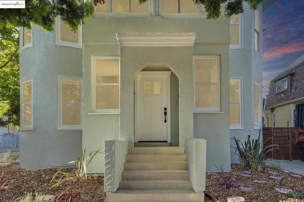 **Transparently Priced** Experience space on a scale you thought impossible in the Bay! This massive, fully-renovated duplex isn't just a home; it's an audacious compound for a life less ordinary. Torn to the studs and brilliantly reimagined, it holds two light-saturated homes: a sprawling 8-bed, 3-bath upstairs and a vast 5-bed, 2-bath below. Soaring ceilings create cathedral-like volume, with huge windows illuminating flawless finishes and wide-plank floors. This is a canvas for a life lived large, from gatherings in the state-of-the-art kitchen to escapes in a spa-like bathroom. Every detail, from new electrical and plumbing to curated lighting, is executed with an obsessive eye for style and permanence. A shared urban oasis offers a landscaped counterpoint to the city’s hum. The real story is the address. Plug into West Oakland's arterial heart—a neighborhood of rich history, vibrant art, and profound resilience. Feel the city's soul walking to Prescott Market or catching the buzz from the Ballers' new field. It’s a rare alchemy: pristine luxury fused with authentic character you can’t manufacture. The expansive home you crave with the vibe you can't find anywhere else. Schedule your tour today!