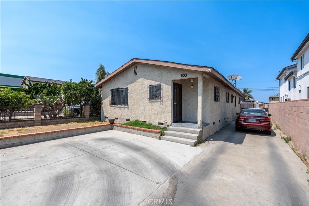 Don’t miss this incredible opportunity! This charming 4-bedroom, 2-bathroom single-family home features a bright, open floor plan that’s perfect for comfortable living and entertaining. This home offers a huge back lot to enjoy family gatherings and an opportunity to build. This home offers LAR-2 zoning which allows for another unit. Located close to schools, shopping, entertainment and major freeways. Close to the Earvin Magic Johnson Recreation Center. Close to the airport and Long Beach Port. schedule your showing today!