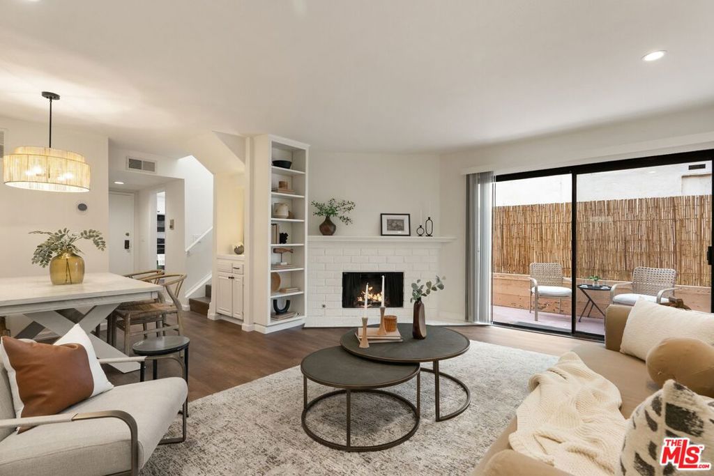 Updated 2-bedroom, 2.5-bathroom townhome in a great, central West LA location. Close to all of what WLA and Brentwood has to offer and easy access to the freeway, restaurants, shopping, and markets. The unit has recently been refreshed with new flooring, paint, and multiple new fixtures. The main level has a convenient powder room and wet bar to service the living and dining rooms. Updated kitchen with granite counters and stainless steel appliances. Upstairs, two full ensuite bedrooms are spacious retreats. The large primary features a cedar-lined walk-in closet. Also features upstairs laundry room, central heat/air, 2 car tandem parking, extra storage and more! Gated/secured building with low HOA dues that includes EQ insurance. Close to Santa Monica and Wilshire Blvd restaurants shops and more. Not to be missed!