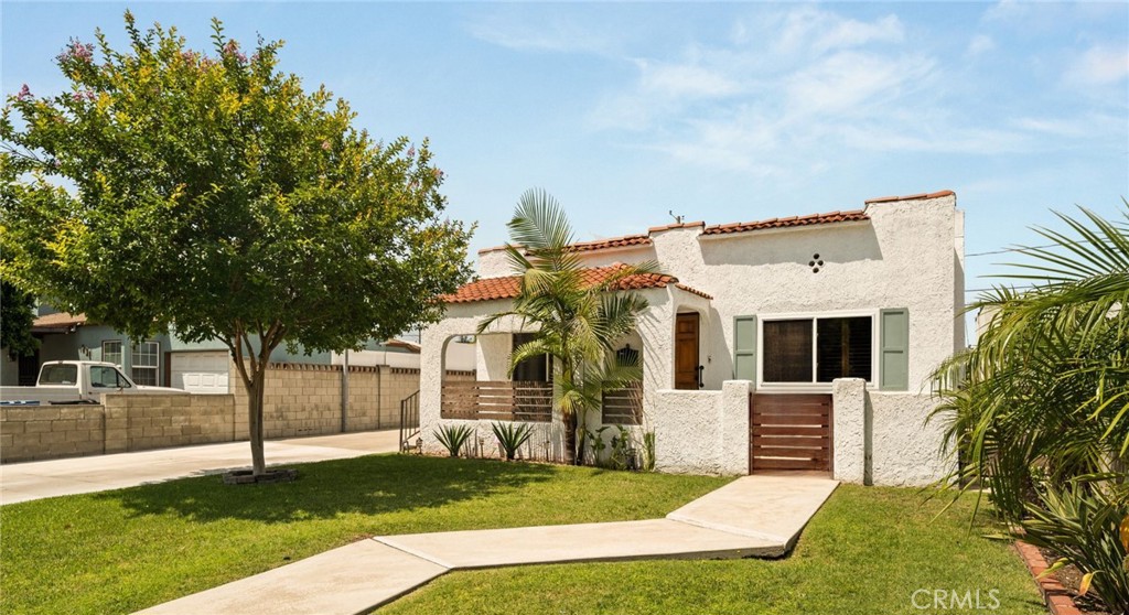 Spanish Charmer with Studio!
This 3-bedroom, 2-bathroom home with a fully detached studio is bursting with character and modern appeal. From the moment you arrive, you’re welcomed by a charming covered front porch and a cozy enclosed sitting area—perfect for unwinding or sipping your morning coffee. Inside, soaring vaulted ceilings and rich wood floors set a warm and inviting tone.
The thoughtfully updated layout features new flooring, stylish modern fixtures, and abundant natural light throughout. Each bedroom includes wall-to-wall closets for generous storage, while the primary suite feels like a true retreat with its spa-inspired bath, complete with a walk-in shower, double vanity, and designer finishes.
What truly sets this property apart is the completely separate studio—ideal as a second primary suite, private guest quarters, or a high-income rental.
Additional highlights include a fully owned solar system, custom landscaping, and an extra-wide extended driveway. The private backyard offers a covered patio, a lush grassy area, and mature trees that create a serene outdoor setting. A detached 1-car garage adds the finishing touch to this exceptional Chandler Park gem.