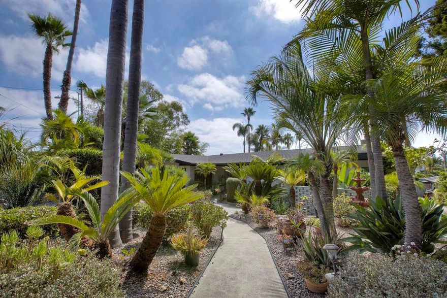 This custom Mid-Century Modern home offers a distinctive blend of style, comfort, and functionality in one of Oceanside’s most sought-after communities. The thoughtfully designed floor plan features hardwood and tile flooring, vaulted ceilings, and expansive windows that fill the home with natural light and capture peaceful neighborhood and sunset views.  A modern and spacious kitchen with generous countertop space and storage is perfect for cooking and entertaining. The open living areas connect seamlessly to a large deck, creating the ideal indoor-outdoor flow for relaxing or hosting gatherings.  The property’s mature, low-maintenance landscaping enhances its privacy and easy upkeep. A rare walkout basement/utility room adds versatility and extra storage space. The large lot provides endless possibilities—expand the home, add a garden, or design your dream outdoor entertaining area.  Located minutes from the beach, shopping, dining, and major commuter routes, this Fire Mountain gem combines mid-century character with modern convenience.