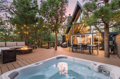 Photo of 587 Villa Grove Avenue, Big Bear City, CA 92314 (MLS # IG26219358)