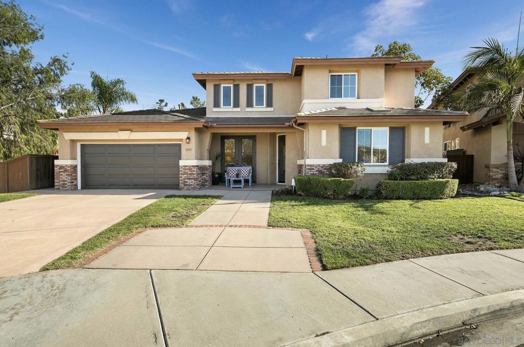 This delightful home is ideally located in the Willows Community of Scripps Ranch. The spacious primary bedroom is located on the first level and features an expansive bath with dual, vanity, walk-in closets and access to the backyard. An additional entry-level bedroom is perfectly situated for a home office, complete with remodeled bathroom. The kitchen was remodeled in 2021 and features Dual ovens, 6-Burner gas cooktop, Bosh dishwasher, large island with Quartz countertops and a built in refrigerator. The kitchen opens to the family room with its warming fireplace and to the backyard where you will enjoy a built in BBQ and outdoor dining spaces. This home also features a solar system to help cut down on high SDG&E bills. Close to Miramar Lake which is wonderful for exercise, walking trails, and recreation. The Address is 11357 Woodcraft Way San Diego, CA 92131.
