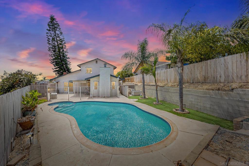 Live the vacation life everyday basking in the sun and splash your cares away in your own private escape nestled on the tranquil block of Paradise Hills. This two-story home is your ticket to vibrant San Diego living with a dash of tranquility. Ready for a full family and then some, the spacious house with its 4 bedrooms and 2.5 bathrooms was designed for families, entertainers, and dreamers alike. As you walk inside the large living room with vaulted ceilings and cozy fireplace radiates warmth, perfect for chill evenings at home.... more in supplemental remarks In addition, a separate family room that’s ready for movie marathons or game nights. The open, airy layout flows effortlessly, inviting you to create memories in every corner. The heart of the home? A kitchen that’s as functional as it is stylish, complete with maple cabinetry, stainless steel appliances, and granite counters. Outside, your private oasis awaits! A fenced pool sparkles under the San Diego sun, ideal for refreshing dips or poolside parties. The covered patio is your go-to spot for al fresco dining or sipping morning coffee while soaking in the peaceful vibes of this quiet neighborhood. With ample space, modern comforts, and a location that blends suburban calm with urban access, this home is a rare gem.