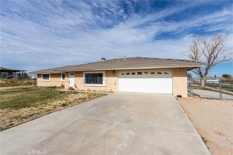 Photo of 13920 Dos Palmas Rd, Victorville, CA 92392 (MLS # HD26085817)