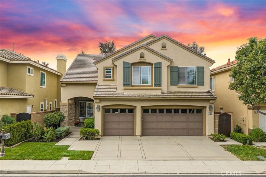 Welcome to 48 Parkcrest, a beautifully updated five-bedroom residence tucked inside the highly coveted, guard-gated Bainbridge community of Northwood in Irvine. With only 91 homes and low turnover, Bainbridge offers an intimate neighborhood setting that perfectly balances privacy, charm, and convenience. From the moment you arrive, the curb appeal is undeniable—manicured landscaping, mature trees, and a welcoming front porch set the stage for what’s inside. Step through the front door and discover a bright, thoughtfully designed floor plan where classic architectural details blend seamlessly with modern upgrades.



The formal living and dining rooms create an elegant space for entertaining, with large windows and French doors filling the home with natural light. At the heart of the home is a remodeled kitchen featuring rich cherry cabinetry, granite countertops, high-end stainless steel appliances, and a charming garden window overlooking the lush backyard. The adjacent family room, offers a brick fireplace and impressive built ins, and flows directly outdoors—an ideal setup for Southern California’s indoor-outdoor lifestyle.



Upstairs, the oversized primary suite offers a peaceful retreat with dual vanities, a spacious walk-in closet, and a separate tub and shower. Four additional bedrooms complete the second level, including one with its own ensuite bath, making the home ideal for guests or multi-generational living.



Step outside to your private backyard oasis, designed for year-round enjoyment with a sparkling spa, built-in BBQ, multiple seating areas, and mature landscaping—perfect for both relaxation and entertaining.



Living in Bainbridge means enjoying the best of Northwood: access to scenic walking and biking trails, community parks, and award-winning schools including Canyon View Elementary, Sierra Vista Middle, and Northwood High. All this, just minutes from shopping, dining, and easy freeway access.



Never before on the market, 48 Parkcrest offers a rare opportunity to join one of Orange County’s most beloved neighborhoods. This is more than a house—it’s a place to call home.