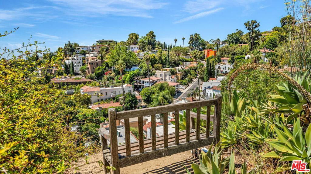 RTI status for a 2bed 2bath 2story home in the Hollywood Heights. Architectural, Structural, Civil & Soil Reports are completed and available. Located at 2172 N Broadview Terrace, this rare hillside parcel sits beside the legendary High Tower Elevator, a privately operated 1920s architectural gem modeled after Italian campaniles and featured in films like The Long Goodbye and Dead Again. You're truly in the hills with sweeping views yet remarkably easy to access, just moments off Highland Avenue without the long, curvy drive typical of hillside properties. Stroll the European-style staircases winding through the neighborhood, or walk to the Hollywood Bowl via a pathway leading into Highland Camrose Park next to Lot B. You're minutes from iconic landmarks including the Hollywood Bowl,Hollywood Walk of Fame, TCL Chinese Theatre, Dolby Theatre, Pantages Theatre, Magic Castle, Hollywood & Highland, and Hollywood & Vine. This cinematic enclave was once home to Ben Affleck and Matt Damon, who famously developed the screenplay for Good Will Hunting while living in Hollywood Heights. Kurt Cobain and Courtney Love also lived in the neighborhood during the early '90s, where Cobain wrote much of Nirvana's In Utero. A one-of-a-kind opportunity to build a home surrounded by views, history, and Hollywood legacy.