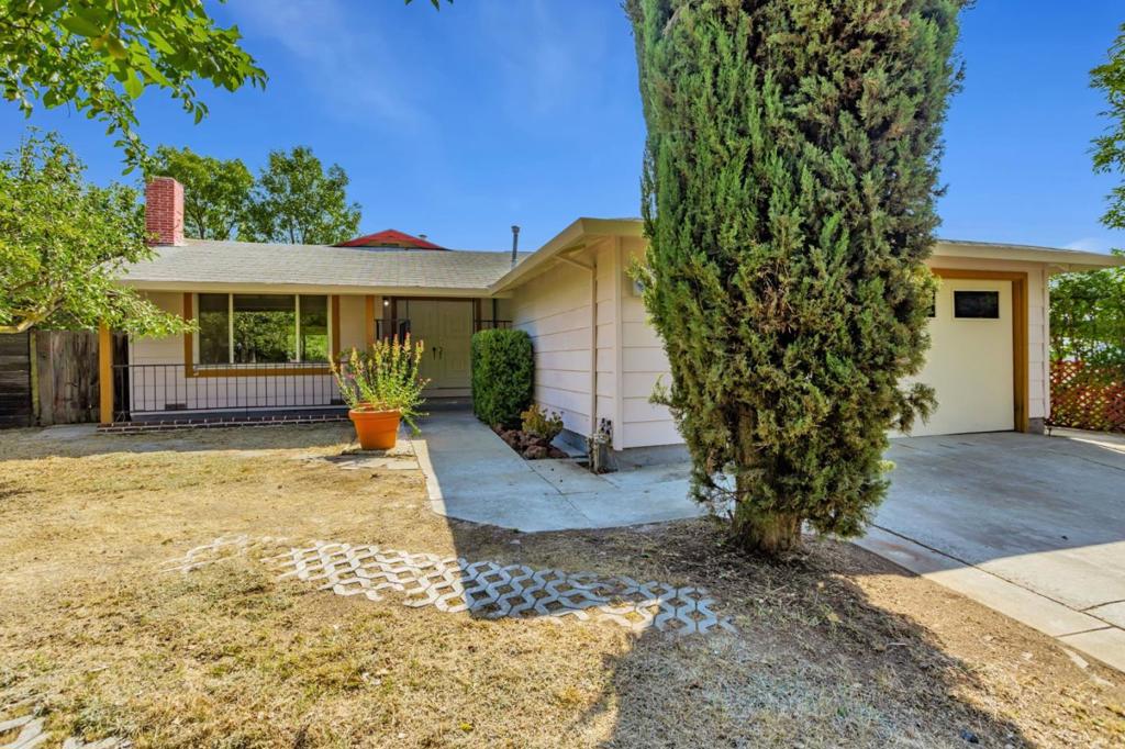 Welcome to your future home. Priced to move in or remodel to your tastes. This property offers a spacious 1,522 square feet of living space, set on a generous 6,490 square foot lot. With three bedrooms and two full bathrooms, this home provides ample room for family living. The kitchen is designed for ease and convenience, featuring an eat-in area/ breakfast room, perfect for casual dining. Enjoy the separate family room/den , ideal for gatherings or a peaceful retreat. A kitchen skylight enhances the ambiance bringing in natural light . Central forced air heating ensures comfort during the cooler months. The property includes a two-car garage for convenient parking and storage. Hardwood flooring and fireplace add character to the interior design.. Don't miss out on this opportunity to make it your own!