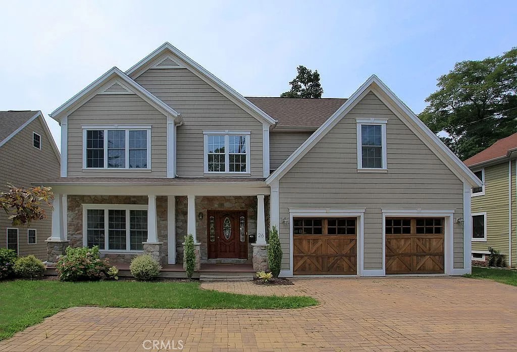 Fabulous custom colonial featuring spacious open floor plan, gourmet kitchen with expansive separate dining area, 2 gas fireplaces, hardwood floors, Family room plus additional 3 third fl Great room, 2nd fl laundry, customized garage. Short distance to town center, NYC trains, schools, library etc. This home has it all and has been impeccably maintained by owners. Photos with furnishings are not current.