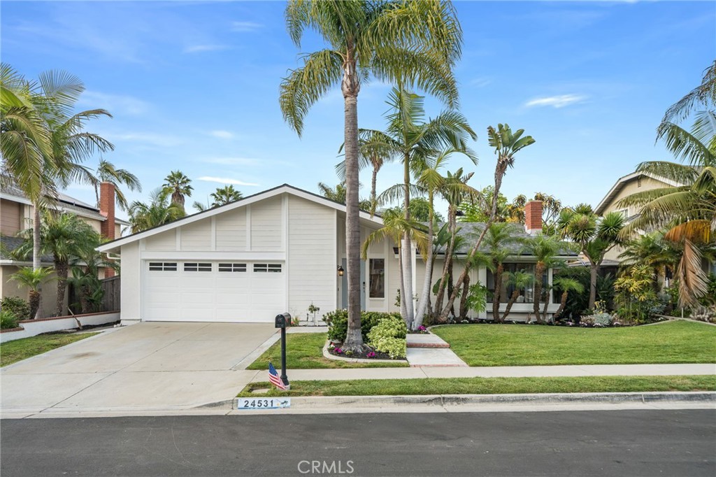 Discover the perfect blend of coastal living and modern comfort in this 1,792-square-foot single-family home in the heart of Dana Point. This 4-bedroom, 2-bathroom residence, complete with a rare, dedicated RV parking space, is ideal for families, professionals, or anyone seeking a serene seaside retreat in Southern California. Step inside to a bright, open-concept interior with fresh interior and exterior paint, creating a clean and welcoming vibe. The updated kitchen, featuring stunning granite countertops and stainless steel appliances, offers a functional space for everyday meals and gatherings, with ample cabinet space for all your culinary ventures. The adjacent living room, warmed by a classic fireplace, provides a cozy spot for relaxation, while the dining area flows seamlessly for easy entertaining. The expansive primary suite is a private haven, complete with a beautifully renovated ensuite showcasing granite accents and designer fixtures, plus ample closet space. Three additional bedrooms, each with rich hardwood flooring, offer flexibility for a home office, gym, or guest rooms. Stylish tile flooring throughout the rest of the home adds durability and a coastal-inspired elegance. Outside, the spacious backyard is a private retreat, featuring a custom firepit and ambient lighting, perfect for al fresco dining or evening gatherings under the stars. The large lot includes rare RV parking with convenient back gate access, ideal for adventurers or extra storage needs. Nestled in a peaceful Dana Point neighborhood, this home is just moments from Dana Point Harbor, world-class beaches like Salt Creek and Strands, and the vibrant Lantern District’s boutique shops, cafes, and restaurants. Enjoy scenic coastal trails, top-rated schools, and iconic Headlands sunsets, all within reach. A true gem in Dana Point’s coveted coastal market, 24531 Priscilla Dr offers unmatched value and timeless appeal. Schedule your private tour today to experience this extraordinary home and seize the opportunity to own a piece of Southern California paradise!