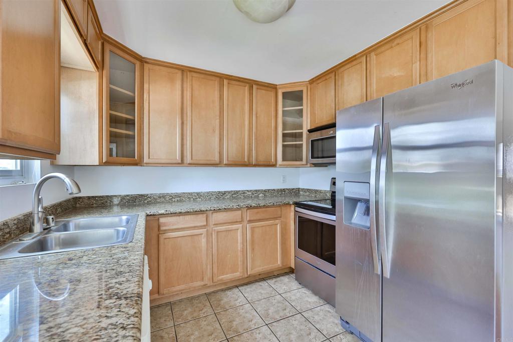 For Rent: Move-In Ready Single-Story Condominium. Minutes from Downtown San Diego.Nestled in a private community, this charming condominium features 3 beds, 2 full baths, no stairs, and a front patio. The fully equipped kitchen and laminated & tile flooring throughout ensure a fresh, easy-to-maintain living space. Enjoy close proximity to the community pool and laundry area for added convenience.Available now & highly sought after, this beautiful condo won't last long. Contact your favorite realtor or our professional management team to schedule a tour today.
