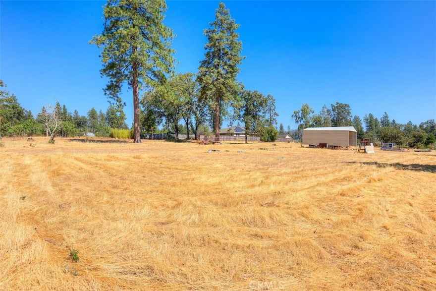 Discover the possibilities with this 0.88-acre lot in Paradise, with the neighboring 0.95-acre parcel at 1479 Bailey Ln also listed separately for sale! Close to town, this property is ideal for anyone wanting both space and convenience. Approved for a 3-bedroom septic through land use review, it’s already a step ahead in the building process. Active PID water is connected, saving you thousands on hookups. Whether you envision a custom home retreat or a smart investment project, this property offers a rare chance to create something special while enjoying nearby lakes, trails, fishing, biking, and endless outdoor recreation.