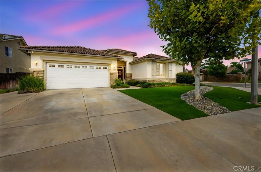 Welcome to 28602 Windridge Drive – a stunning single-story home designed for entertaining and everyday comfort!

Offering 2,773 square feet of beautifully designed living space, this 4-bedroom, 3-bathroom residence sits on a desirable corner lot and showcases impressive curb appeal with its lush artificial turf front yard for a clean, low-maintenance look year-round.

Inside, you’ll find an open and inviting floorplan that seamlessly connects each living space. The formal living room has been transformed into a stylish bar, creating the perfect centerpiece for gatherings with direct access to the formal dining room, family room, kitchen, primary suite, and backyard. A stone fireplace adds warmth and charm to the main living area, creating an ideal space to relax or entertain.

The chef’s kitchen is open to the family room and features a large central island, white cabinetry, custom countertops, a subway tile backsplash, and stainless-steel appliances. With multiple access points to the backyard and formal dining area, this layout makes hosting family and friends effortless.

The primary suite offers a peaceful retreat with LVP flooring, backyard access, a sliding barn door to the ensuite bath, and a mini-split HVAC system for personalized comfort. Three additional bedrooms complete the home—two connected by a Jack & Jill bath and a third currently set up as an office with a built-in desk, adjacent to the guest bathroom.

Step outside to enjoy the private backyard featuring a covered patio, artificial turf, large concrete entertaining area, above-ground spa, garden, BBQ space, and storage shed.

Located in a highly convenient area near the 215 freeway, Mt. San Jacinto College, shopping, and dining, this home perfectly blends style, functionality, and location.