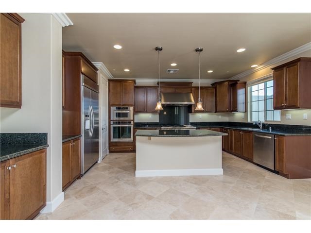 EXECUTIVE HOME! ELEGANT EUROPEAN AMBIENCE! STUNNING VIEWS! SUPERB LOCATION! Walking distance to schools, parks, restaurants, shopping. Large, private backyard with panoramic mountain & canyon views. Inside features a spacious and flexible floor plan, large bedrooms, outsized loft, tall ceilings, folding patio doors and more. Beautiful craftsmanship, fabulous travertine and wood floors throughout the house.Take advantage of Solar Panels and save money on energy bills. See Supplement Deluxe kitchen with a large center island, granite counter tops, maple cabinets, gourmet stainless steel top-of-the-line appliances. Chic master suite with spa-like master bath, walk-in over-sized closet and large comfortable balcony.Guest bedroom with full bath is located on ground floor. Neighborhoods: Rancho Penasquitos View: Evening Lights,Valley/Canyon Sewer: Sewer Connected