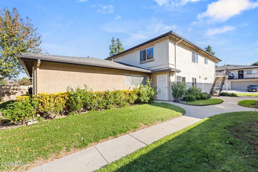 Welcome to 2026 Calle La Sombra, Unit 2, in Simi Valley - a charming two-story townhome in a well-maintained community that feels more like a residential neighborhood than a condo complex. Light, bright, and move-in ready, this home offers comfort, convenience, that's easy to make your own. Fresh interior paint, energy-saving dual-pane windows, tile flooring, and a dining-area ceiling fan enhance the home's appeal. The open floor plan flows into the kitchen, complete with a breakfast bar, tile countertops, stainless steel sink, recessed lighting, and a generous pantry closet. Upstairs, you'll find two spacious bedrooms, one featuring a walk-in closet and vanity area, the other with mirrored wardrobe doors. The full hall bathroom includes a tiled shower/tub combination, and additional linen cabinetry provides extra storage. Parking is simple with a one-car garage, an additional assigned space, and ample guest parking nearby. The home is just steps from the community pool, playground, and scenic walking paths throughout the manicured grounds. Located minutes from shopping, dining, Starbucks, top-rated schools, and convenient freeway access, this townhome offers the ideal blend of comfort, community, and accessibility.