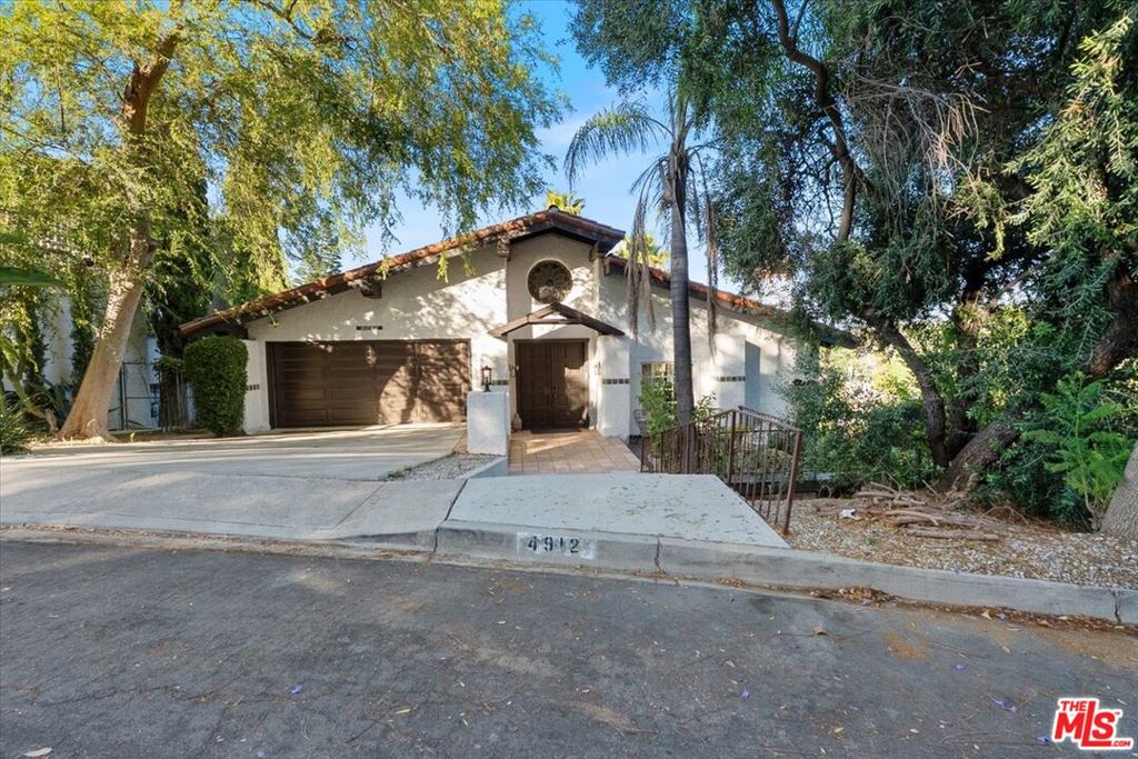 Photo of 4912 Llano Drive, Woodland Hills, CA 91364 (MLS # 26855555)