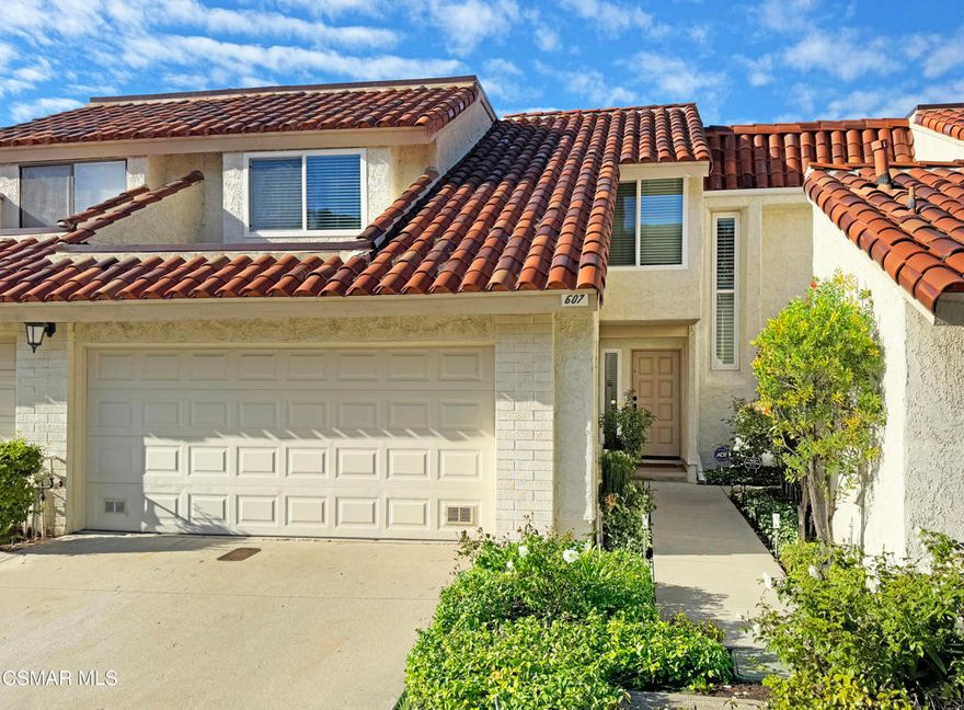 Stunning remodeled Newbury Park home, where attention to detail and style are reflected in every room and complemented by an amazing private patio with spectacular views! As you enter the welcoming front door and step into the entryway, you are immediately drawn in by the pristine dark wood flooring and inviting living room complete with a fireplace, vaulted ceiling and beautiful view. Continue onto the dining area and kitchen with its white shaker style cabinetry, granite countertops, newer stainless steel appliances, double sink and breakfast bar. Beautifully remodeled powder room with dark wood cabinetry and oversized neutral tile flooring. As you ascend the stairs, notice the gleaming wood flooring is continued up the stairs and into the bedrooms. Be sure to linger in the large primary bedroom with 2 closets and lovely view, as well as its stylishly remodeled master bathroom with beautifully tiled oversized shower, shaker style cabinetry, and stone countertop. Meander through the spacious secondary bedrooms as well as the stunning remodeled hall bathroom with tub, stone countertop and dark wood cabinetry! Freshly painted interior, dual pane windows and 3 year new HVAC! Direct access 2 car garage with laundry area! Now step outside to the spacious private patio with its beautiful view and imagine living in this fabulous property! Community pool and lushly landscaped green belts too!