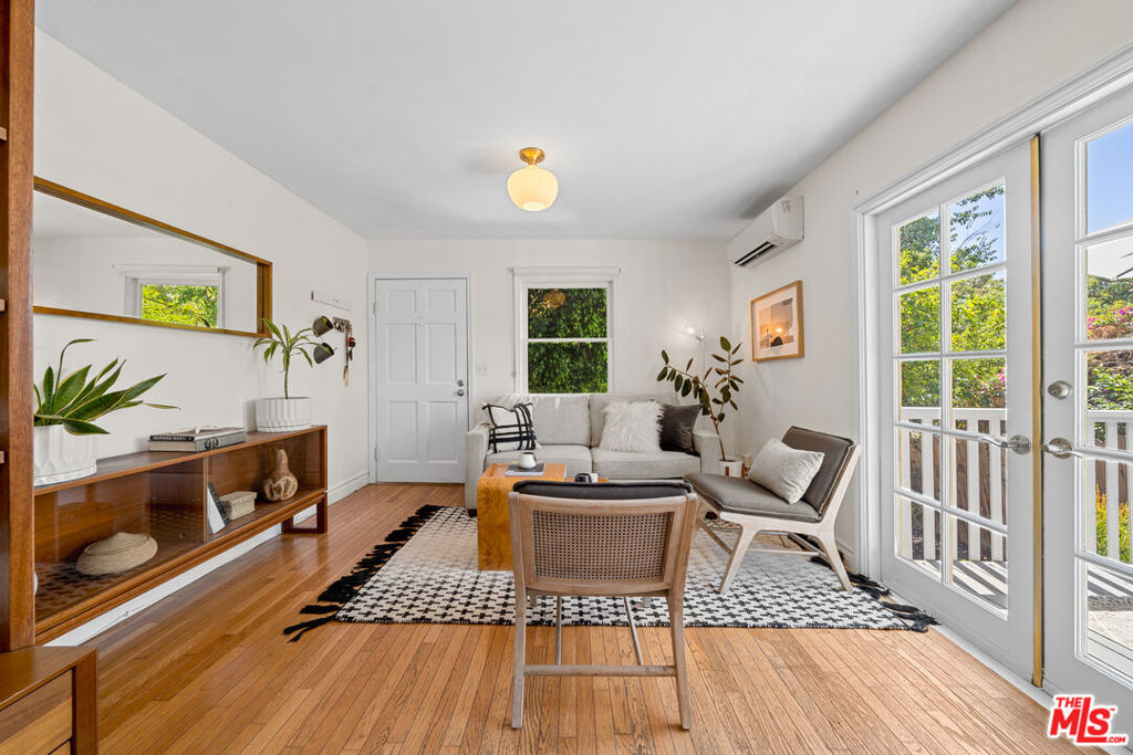 1471 Wallace Avenue is a cozy, bright 2-bed, 1-bath bungalow that checks all the boxes for first-time buyers, creatives, and young families looking to own in one of Echo Park's most iconic enclaves. Perched in the hills of historic Angeleno Heights, this fully updated and well-cared-for home exudes pride of ownership and offers a blend of character, comfort, and smart design. Inside, you'll find an open-concept layout, hardwood floors, and a sunlit kitchen that flows directly to a spacious outdoor patio -- perfect for alfresco dining, entertaining, or winding down under the stars. The front and back yards are beautifully landscaped and ideal for anyone who loves to garden, relax, or host. The 9x9 detached bonus shed with A/C, electricity, and wired internet is perfect for a home office, creative studio, or gaming room. Additional highlights include a private laundry room and 1-car parking. Just down the hill from Echo Park Lake and minutes from local parks, cafes, and hotspots across Echo Park, Silver Lake, and Elysian Park. Eligible for a $20,000 grant toward closing costs--no repayment required. Great value--this gem won't last!