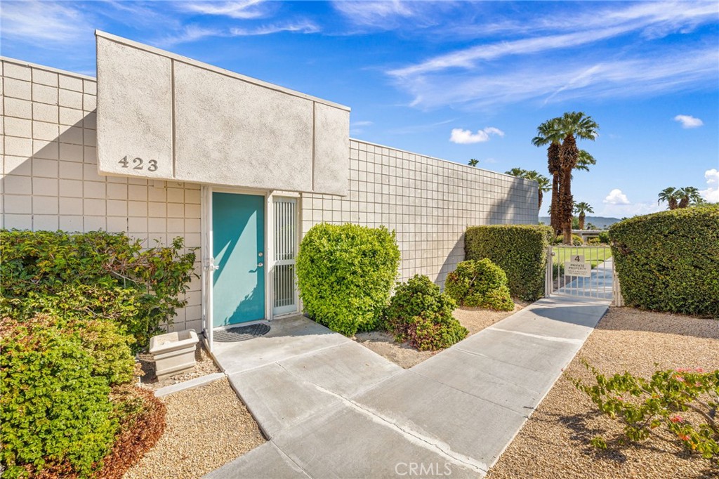 Rare historic jewel of the desert! Mid Century modern unit by renowned architect William Krisel. Come enjoy the family friendly Sandpiper community. This unit is the largest plan with 3 bedrooms and 3 bathrooms, stunning mountain views and is close to the desirable El Paseo shopping district. The kitchen features abundant storage, corian countertops, custom cabinetry and flows nicely into the large open living space with vaulted ceilings. This unit features 2 primary suites, a private courtyard and a relaxing patio overlooking the pool area. Circle 4 is the only circle in the development with a spa.