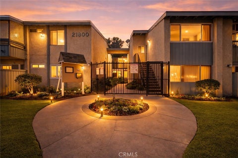 Photo of 21800 Schoenborn Street #215, Canoga Park, CA 91304 (MLS # SR26224250)