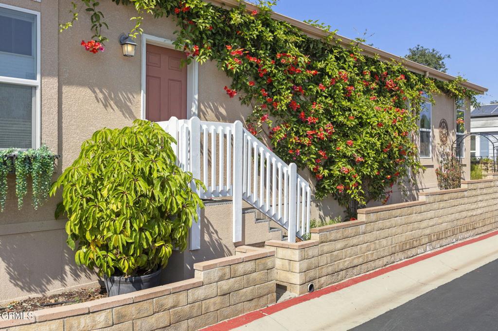 Spacious 3 bedroom 2 bath home located in Ojai's esteemed Oak Haven senior (62+) gated community of 22 energy efficient manufactured homes. Pride of ownership and true quality are displayed throughout the home, from a generously sized kitchen with quality appliances, updated bathroom with a soaking tub and separate shower plus a private outdoor patio with a deck and a BBQ area. 9ft. ceilings give the home an elevated feel and the fireplace adds a sense of coziness, with oversized windows allowing an abundance of natural light to flow through the spaces. The solar panels are an added bonus, and the location is ideal~ on a quiet street just a short distance to the Ojai Meadows Preserve, you will find this quaint spot where privacy and a sense of serenity envelop the property. Don't miss this opportunity to claim your own magical slice of the Ojai lifestyle in this sweet, desirable community!