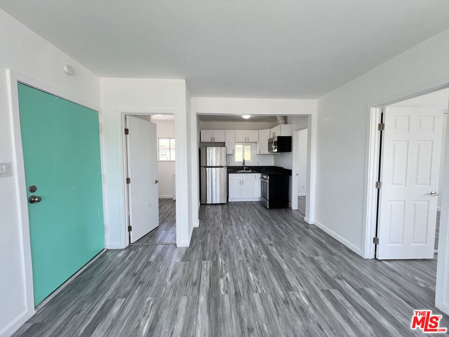 Welcome to this cozy 2-bedroom apartment in a 4-unit building in the heart of Los Angeles. With approximately 800 sq. ft. of living space, this move-in-ready home offers a comfortable and functional layout in a convenient location near the Crenshaw Metro Rail Line. The apartment features a bright living area and a kitchen equipped with a stove, refrigerator, and microwave. Both bedrooms offer ample closet space and a comfortable layout for everyday living. Parking is available with two spaces for $50/month. Tenants are responsible for electricity, gas, trash, renters' insurance, and any additional services they may need. Located near Leimert Park Village, Baldwin Hills, and Downtown Inglewood, this apartment offers easy access to shopping, dining, and public transportation a cozy, move-in-ready home in a central Los Angeles location.