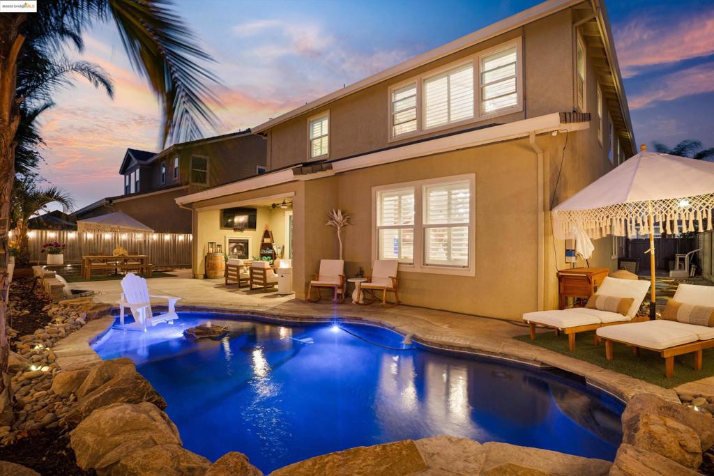 Welcome to one of the Most Exclusive and Beautifully Upgraded Homes in Discovery Bay's Premier gated community — THE LAKES. Built by Kiper Homes, one of the area’s most Respected Builders, this residence is part of the Ultra-Limited Anchor Pointe Collection, which includes Only 42 of the 1,206 homes in the Entire Community. Built in 2016, this home showcases one of Kiper’s most sought-after floorplans, designed for both Comfort and Luxury. The Stunning Owner’s Suite is a Private Retreat featuring a Spa-inspired bathroom with Double Walk-In Closets, Elevated Finishes, and a Calming Ambiance. A Spacious Downstairs Bedroom with its own En-Suite provides excellent flexibility for guests or multigenerational living. Entertain in Style with a dedicated media room and a Custom Upstairs Bar within the Open Loft — perfect for movie nights or hosting friends. Step outside to your personal Backyard Oasis featuring a Pebble Tec In-Ground Pool, an inviting California Room with built-in gas fireplace, and plenty of space to Relax or Entertain. This home sits in a Prime Location within the community, just steps away from the neighborhood park, kids’ playground, and pickleball courts. This is a rare chance to own one of the exclusive 42 Anchor Pointe Homes — a True Standout in Discovery Bay.