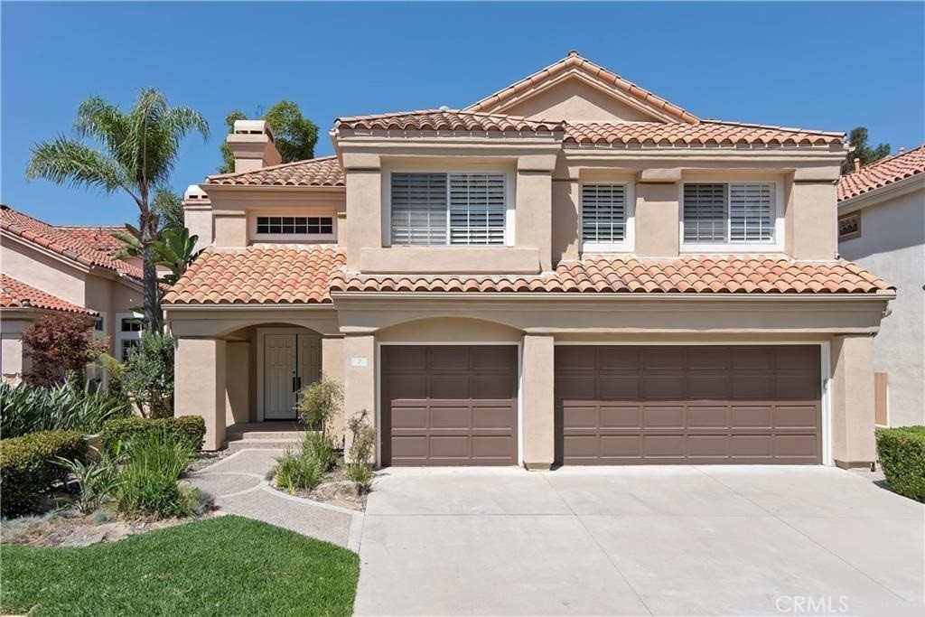 Gorgeous View Home on a single-loaded cul-de-sac street in the coveted coastal community of Marina Hills. This Spacious Home has 4 ensuite bedrooms, each with its own bath, plus an expansive Bonus Room! Stunning ceramic wood plank flooring throughout the first level. Soaring two story ceilings, a handsome fireplace and windows galore in the Living Room with a walk behind bar. Downstairs are a bedroom and bath and a separate Powder Room for guests. There is a formal Dining Room and the Family Room is open to the Kitchen and features a 2nd fireplace. The island Kitchen is updated with quartz countertops, subway tile backsplash, BOSCH appliances, Stainless Steel Built-in Fridge, white Shaker cabinetry and a sunny Nook! The Master Suite is enhanced by a 3rd fireplace, a generous walk-in closet and a luxurious bath! All the bathrooms have been upgraded quartz countertops, and designer faucets. Stainmaster carpet in the bedrooms, the bonus room, and on the staircase. A laundry room with convenient utility sink provides access to the 3 car garage with both remote and keypad access. The serene backyard offers privacy and panoramic views that fill this Home with light! Enjoy the fabulous amenities of the Marina Hills Community Center which includes a clubhouse, Olympic size pool, tennis courts, parks, and more! This is an exceptional property in a premier community!