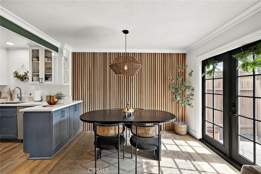 Discover the perfect blend of style and comfort in this beautifully upgraded two-story residence. Located in the desirable Anaheim Hills community, this home offers a modern aesthetic that feels straight out of a magazine.



As soon as you step inside, you’ll be wowed by the stylish home featuring a stunning wood wall that adds character to the downstairs area, while wainscoting in the hallway exudes sophistication. The dining room features a chic light fixture, perfect for at-home dining and hosting gatherings. Enjoy the benefits of a new AC system and new flooring throughout the home, ensuring a fresh and inviting atmosphere. The kitchen features elegant quartz countertops and a new dishwasher, making meal preparation a joy. A new washer is included in the indoor laundry area for added convenience. The living room is enhanced with recessed lighting and a stylish electric fireplace, creating a warm and welcoming ambiance. A custom closet in the primary suite provides ample storage, ensuring that every space is utilized efficiently. Step outside to a low-maintenance backyard with lush turf, perfect for entertaining or enjoying quiet evenings outdoors. This home includes an attached two-car garage and access to two community pools, ideal for relaxation and socializing. Situated near top-rated schools, scenic trails, and parks, this property is perfect for families and outdoor enthusiasts alike.



Don’t miss the opportunity to make this designer home your own, it’s the ultimate combination of luxury, comfort, and convenience.