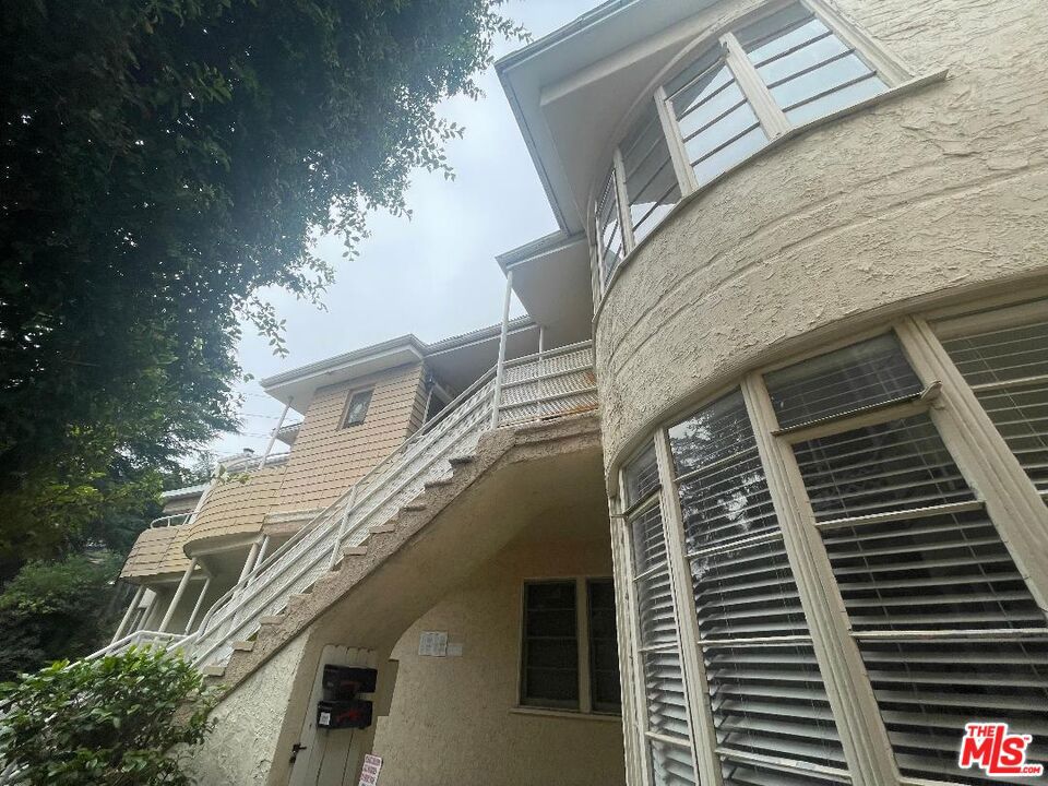 Perfect Owner-User Investment. Owner's Unit 2 Bed + 2 Garage Parking + Huge View Balcony & More! Fantastic 5-Unit Investment Property in a Prime Los Feliz Location! Perfect as an Owner-User Investment with 4 additional Rental Income's to support your Ownership! Rare opportunity to own a Classic Los Angeles multifamily asset in the Heart of Los Feliz, one of the City's most Desirable and Rapidly Growing Neighborhoods! This Charming 5-Unit Investment Features timeless LA Architecture and offers immediate Income with a strong upside potential! Well maintained and ideally located near Griffith Park, Silver Lake, and Hollywood, the property sits in a High-Demand Rental Area known for its walkability, vibrant local culture, and continued development. PROPERTY HIGHLIGHTS INCLUDE: 5 Total Units with stable tenancy; Classic LA Archtecture with Character Features; Excellent income-producing opportunity; Potential for Rental-Upside and Value-Add Improvements; Situated in one of L.A.'s strongest rental submarkets; Close to Bus Transit, Parks, Shops, Dining, Tennis Courts, Golf Courses, Public Pool, The Greek Theatre, The Griffith Park Observatory, Multiple Grocery Stores, Movie Theaters, Hiking Trails, Many Banks, Curio Shops, Cedars Hospital, Medical Doctors, Health and Spa Centers, The Los Angeles Zoo, Picnic Areas, The Train Museum, The Park Merry-Go-Round, and So Much More; And close to the Freeway for easy access North and South! Great for both Owner-Users and Investors seeking long-term growth and consistent returns. Don't miss this opportunity to acquire a Prime Multifamily property in a Premier, and Highly Regarded L.A. neighborhood! Also, there is a Laundry Room and there are 3 Two-Car Garages accessed by way of the Alley behind the property. MORE DETAILS: The Owner's Unit is on 2 levels, with 2 addresses: UpStairs 3759 Los Feliz Blvd. & DownStairs 3761 Los Feliz Blvd. with 220 Wiring And with access to 2 Wood Burning Firepaces, Plus a Wet-Bar! And the Laundry Room has a Private access for the Owner's Unit, and a Community access for all other Tenants. And the Owner's Unit 2 Car Garage has the abitlity to Expand by 5 to 6 Feet More, which is perfect for a Longer Van or Hook-Up Auto Attachments! Plus 2 of the remaining 4 One Bedroom Units also have Wood Burning Fireplaces! And there is SO MUCH MORE!
